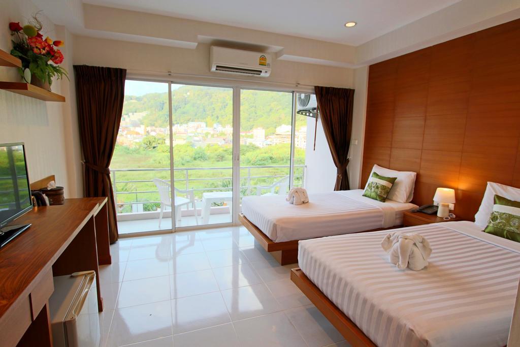 Good Nice Hotel Patong Quarto foto